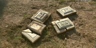 Vandals steal, destroy more than 50 headstones in cemetery, owner says