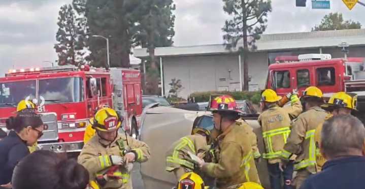 2 trapped, extricated from Panorama City crash