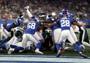 NFL says it's trying to improve officiating on 'very difficult' tush push plays