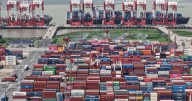 Who really pays when Trump imposes tariffs? It's not other countries, economists say