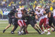 Oregon holds steady in polls after beating Wisconsin