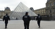 Paris Louvre robbery sends tourists fleeing in panic