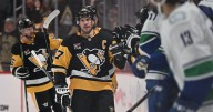 Crosby scores, Letang reaches career milestone as Penguins breeze past Canucks 5