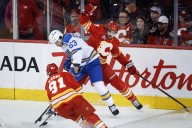 Neighbours scores twice in 4-2 Blues win against Flames