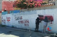 A pintar todas las bardas porque viene el Informe
