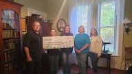 Quartermania auction raises $1,307.97; Woman’s Life adds $500 more