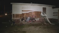 Car plows through East St. Louis home