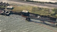 Oil spill contained after vessel strikes pier in Galveston, Coast Guard says