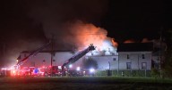'He just walked out.' Canton Fire battles massive flames at abandoned apartment building