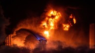 Flames visible for miles after a fire erupts at a Chevron refinery outside Los Angeles