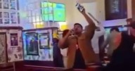 Machete thug pushes past karaoke pub punters before hacking man 'enjoying pint'