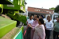DDC Presents keys of Combine Harvester to HADP beneficiaries