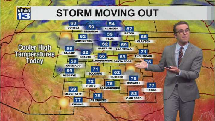 Leftover rain & Northern New Mexico snow showers