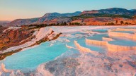 The magical white stone wonderland with effervescent bathing pools