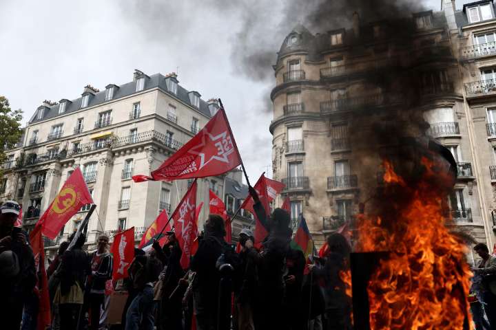 French Workers March Against Spending Cuts