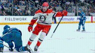 Carlsson gets 3 points, Ducks score 7 to rally late for OT win against Sharks