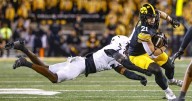 Why does Iowa always elect to receive the opening kickoff despite opening drive struggles?