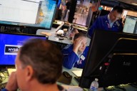Wall Street drifts around its all-time highs as gold keeps rising to records