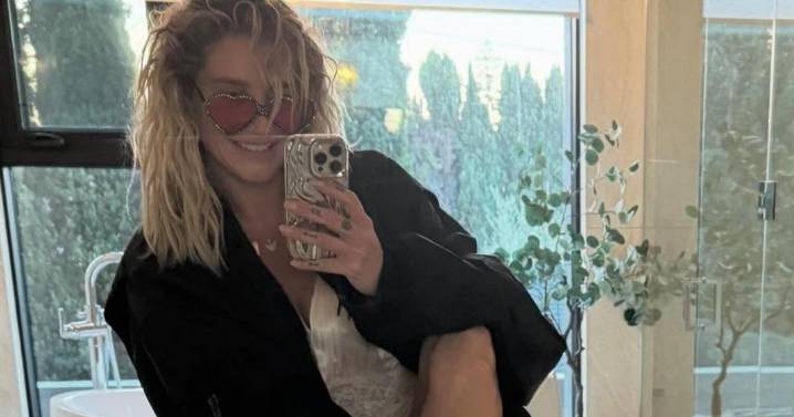 Kesha Turns Heads in White Mini