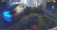Bodycam video shows Foxboro police officer pull driver from burning car after crash into house