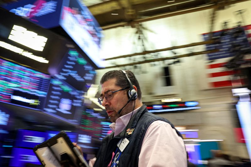 Wall Street futures gain as corporate earnings momentum builds