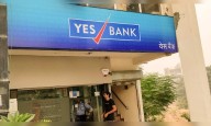 Yes Bank shares give up early gains but volumes lower than Friday