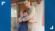 Holding his father’s photo, a North Texas boy climbs toward closure