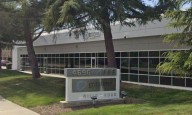 East Bay office building bought at price below its prior value