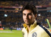 Entusiasmado Checo con Cadillac