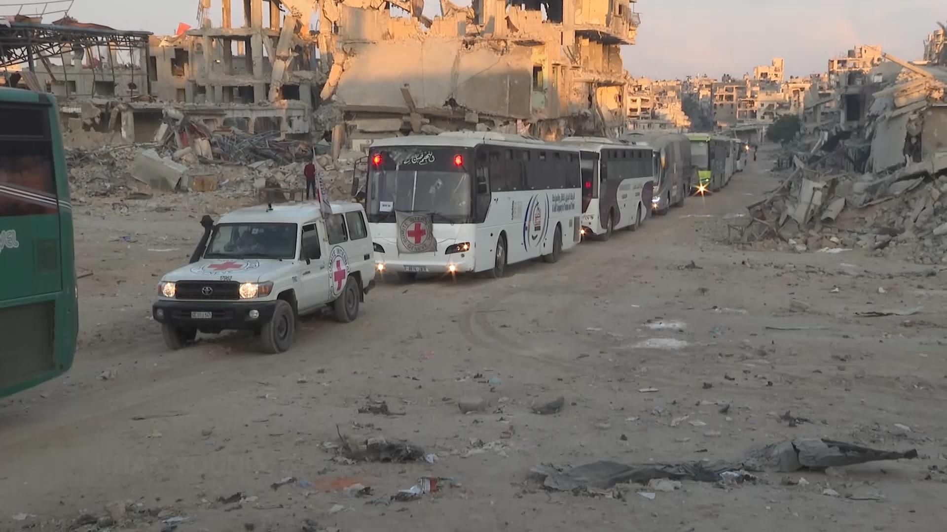 Red Cross vehicles seen in Khan Younis, apparently heading to pick up released Palestinian prisoners
