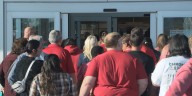 Grand Island Target holds ribbon