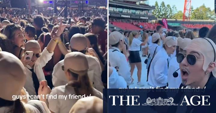 Sea of bald caps in honour of Pitbull