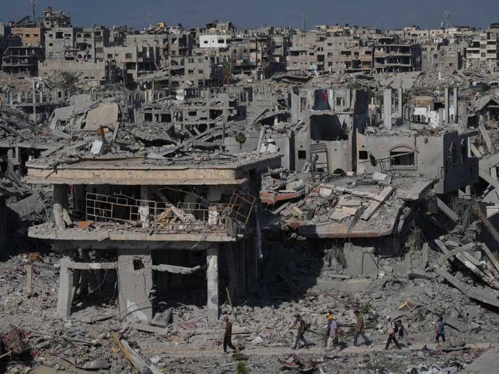 Palestinians return to ruins; U.S. troops in Israel as ceasefire holds