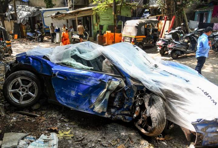 Porsche racing BMW crashes into divider on Mumbai highway; 2 injured