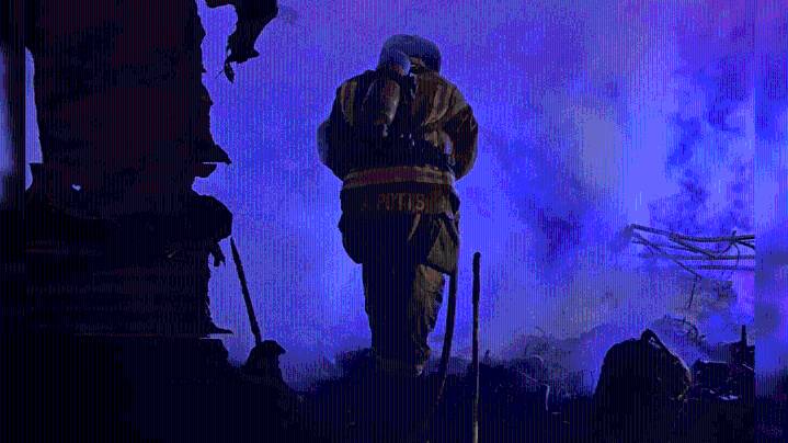 PHOTOS: Firefighters save shop from camper trailer fire in Cass County