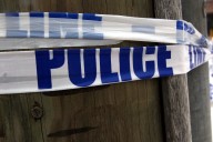 Gunman called 911 to report killing outside central Pa. bar: police