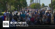Hundreds gather for "The Longest Table" potluck in the Pacific Palisades