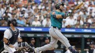 Mariners fan goes viral for catching Cal Raleigh’s 61st HR in ‘Dump Here’ shirt