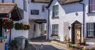 The 'frozen in time' village with car-free streets home to Beatrix Potter's favourite pub