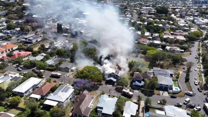 Fire crews battle blaze at two-storey home in Coorparoo