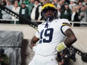Justice Haynes runs for 152 yards and 2 TDs as No. 25 Michigan beats Michigan State 31