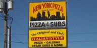Pizza operator responds after mother accused of dog abuse