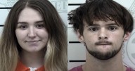 Two people arrested on human trafficking charges, police say