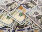 El dólar oficial se mantuvo estable ante una nueva intervención oficial; caen los financieros