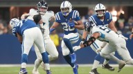 Jonathan Taylor scores 3 TDs as Colts pound Titans 38-14 and move to NFL