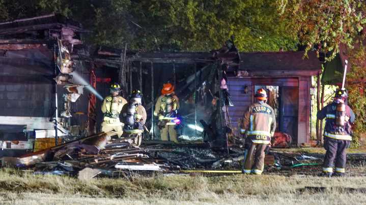 Investigation underway after home catches fire in Manor