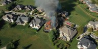 Crews battle massive house fire in Lexington