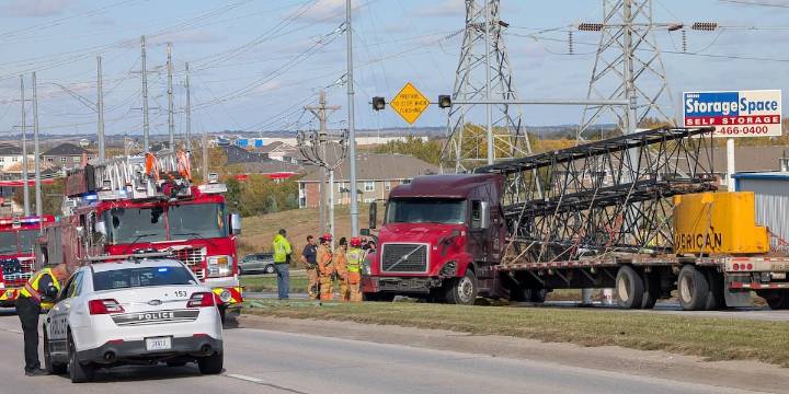 Semi jackknifes in northeast Lincoln, disrupting traffic and spilling fuel