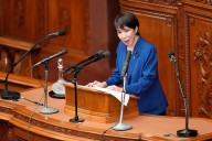 Japan’s new leader vows to further bolster defense buildup and spending as regional tensions rise
