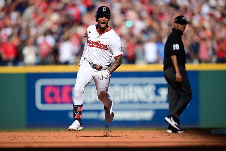 Guardians stay alive, rout Tigers to even AL wild